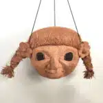 Kokoskopf als süßes Mädchen