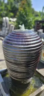 Wasserspiel im Blumentopf