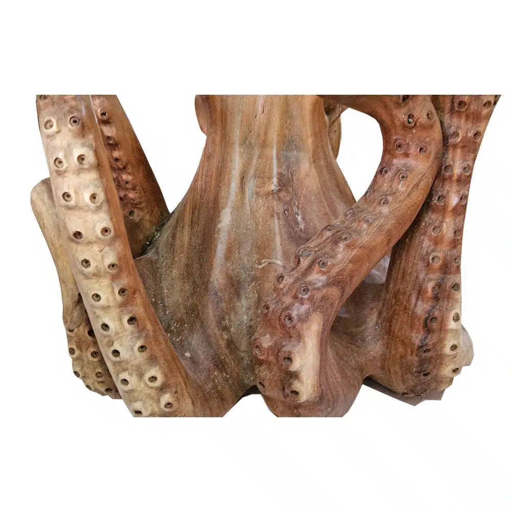 Glastisch von einem Tintenfisch getragen Glastisch von einem Tintenfisch getragen