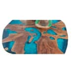 Rivertable in blau mit Wurzel als Tischbein